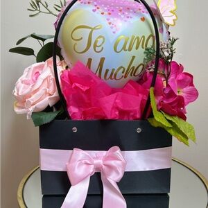 Elegant Black Gift Bag with Pink Accents